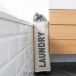 Kapea pyykkikori pyörillä, Laundry