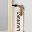 Kapea pyykkikori pyörillä, Laundry